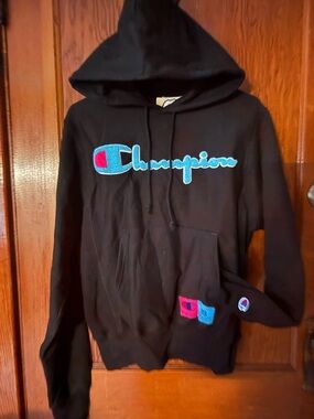Champion Black Hoodie with Blue and Pink Logo